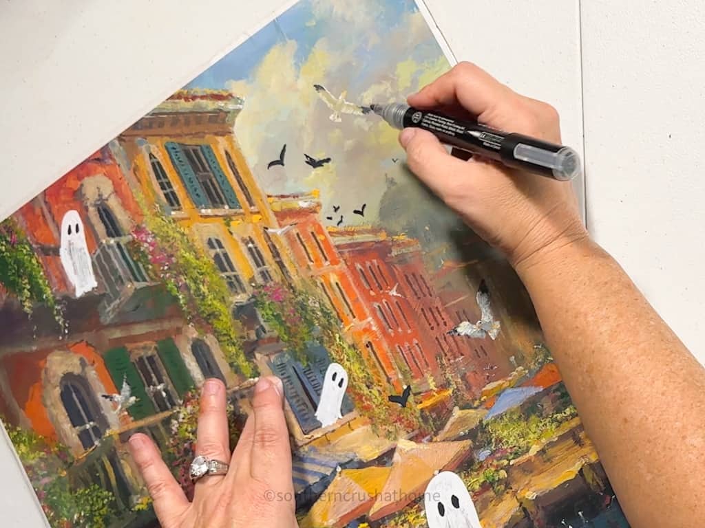 adding bats to the sky on a painting