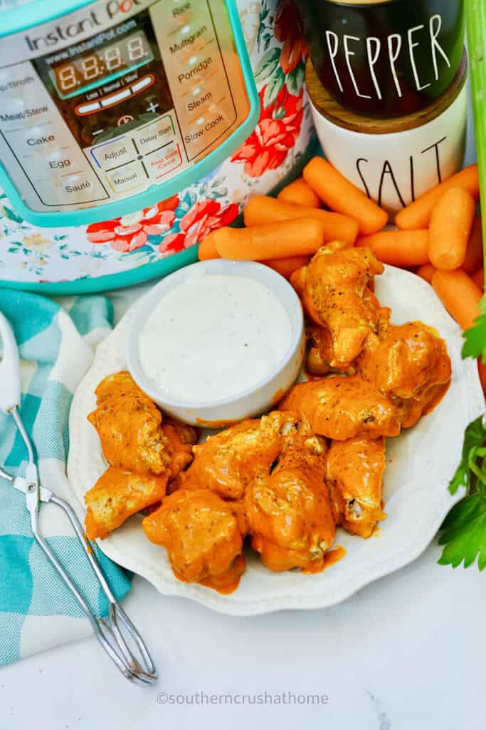 view of ranch dressing with buffalo wings