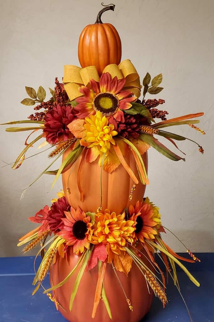 fall foliage stacked pumpkins