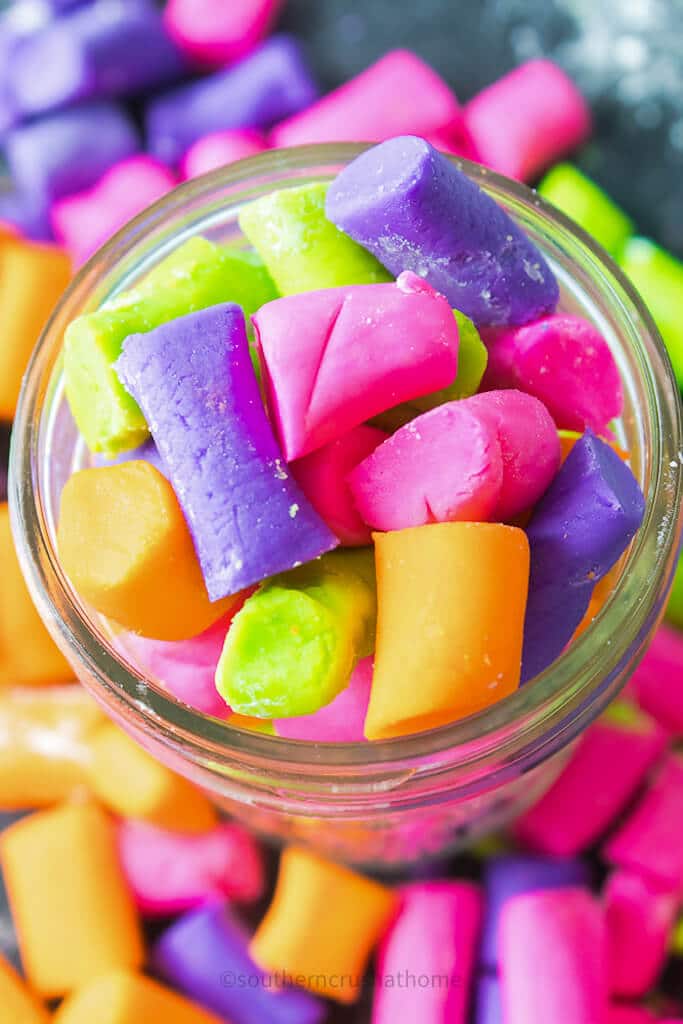 brightly colored buttermints in mason jar