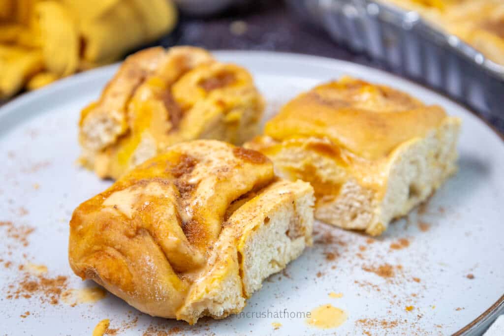 up close of slices of pumpkin cinnamon roll casserole