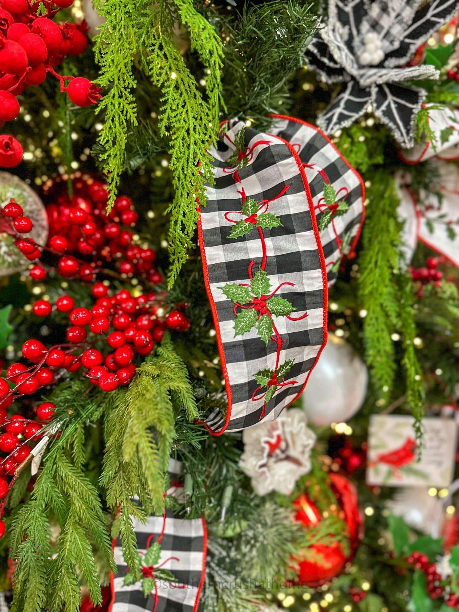 holly ribbon on christmas tree