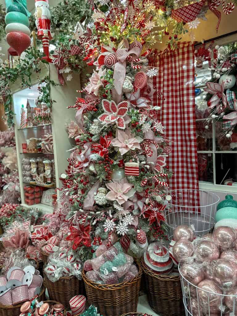 red and white christmas tree with peppermints