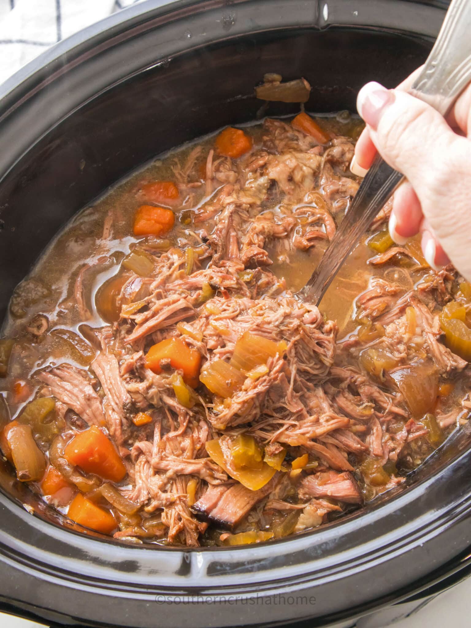 spoonful of cooked pot roast