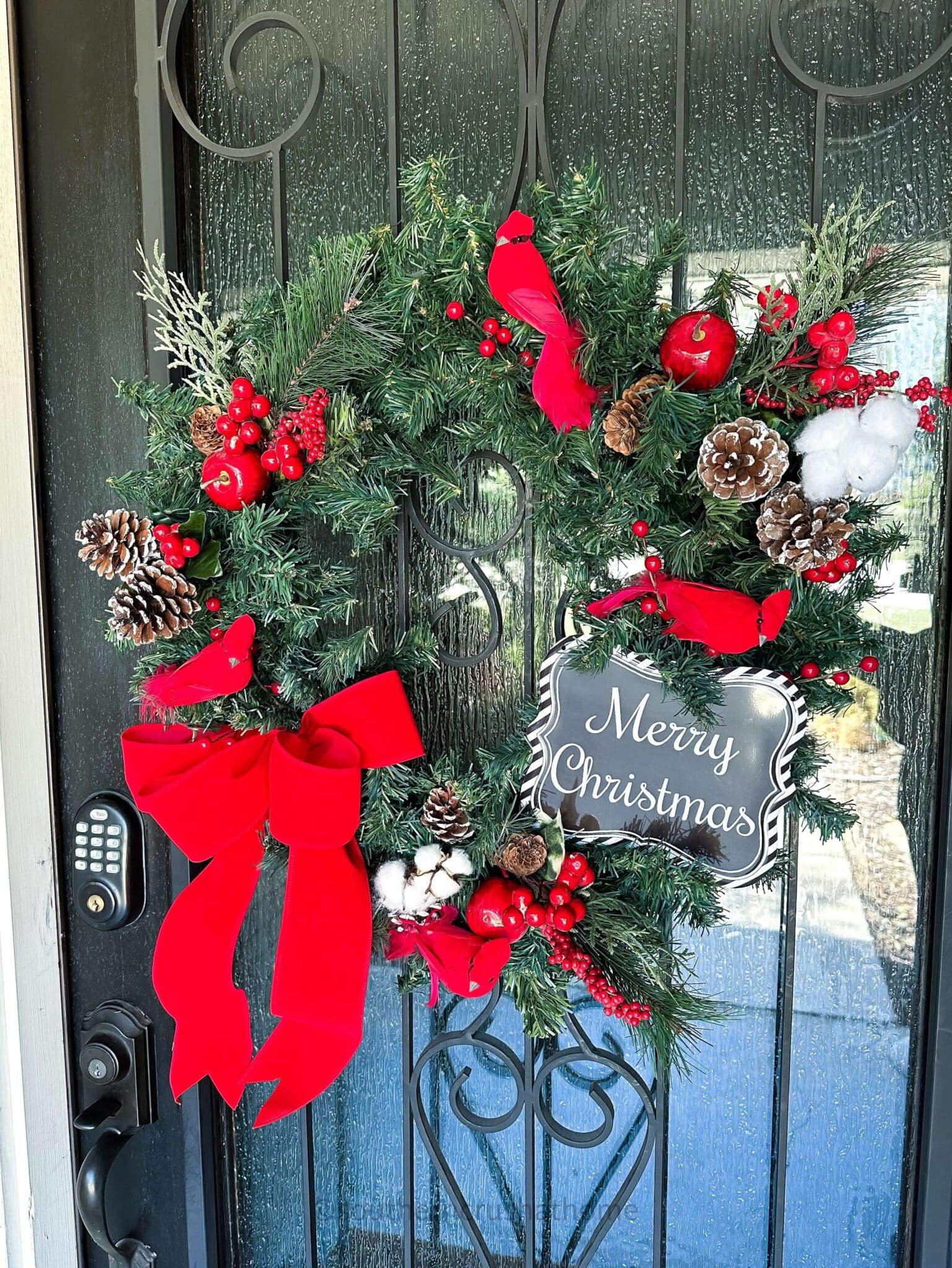 close up of red bird wreath