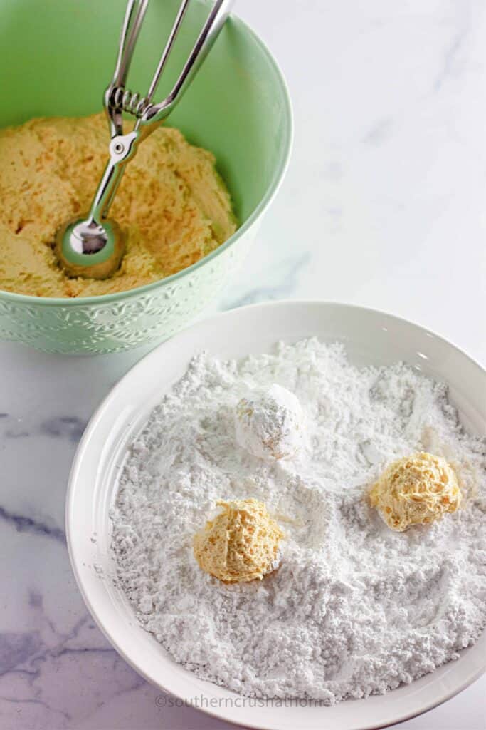 cookie balls in powdered sugar