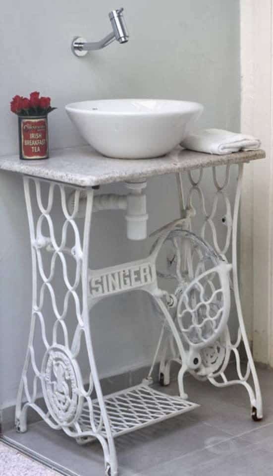 vintage sewing machine base as sink