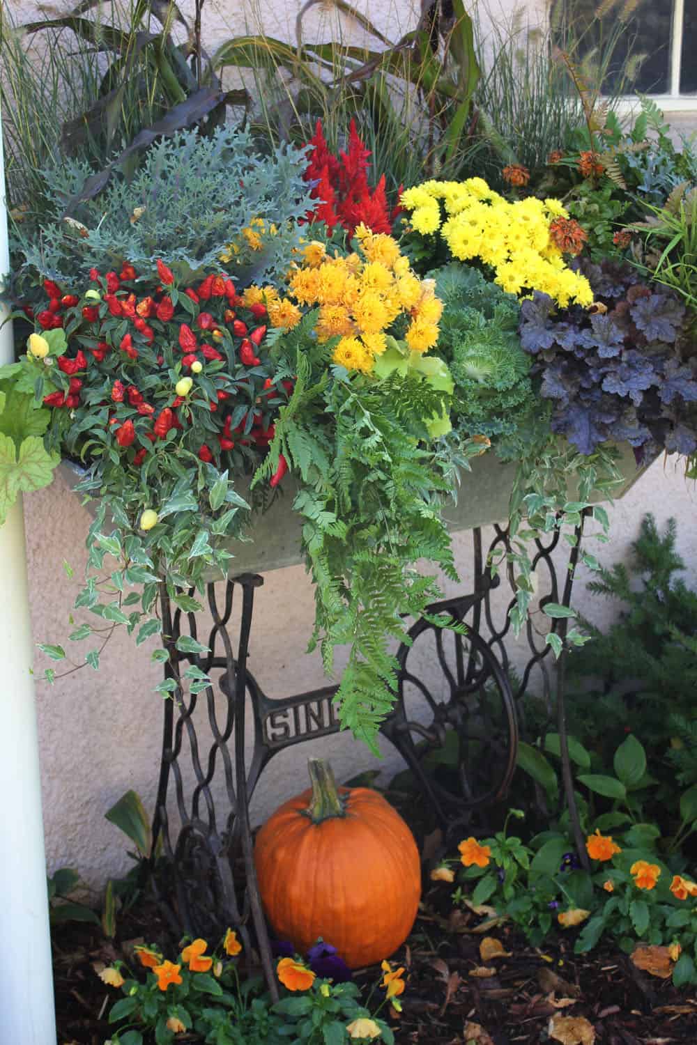 vintage sewing machine base as a planter