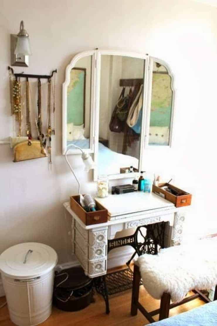 vintage sewing machine base as vanity