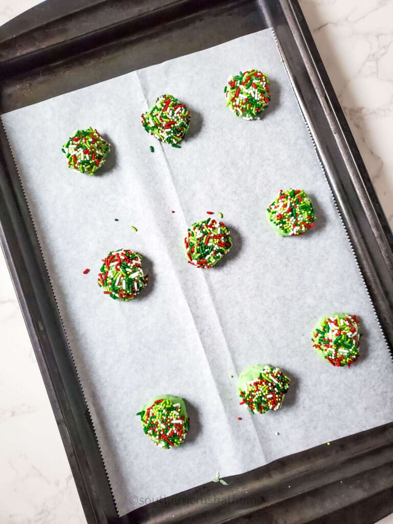 sprinkle cookies on baking sheet
