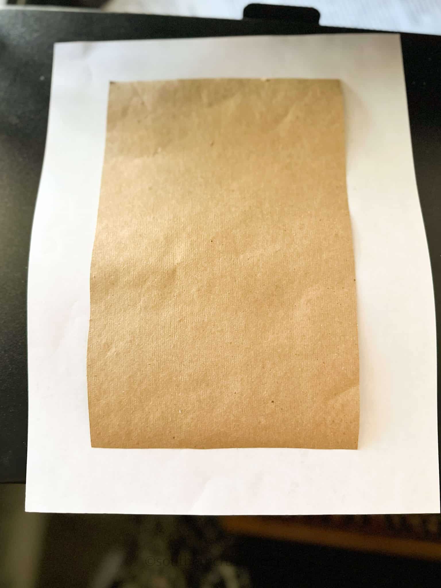 kraft paper centered on printer paper