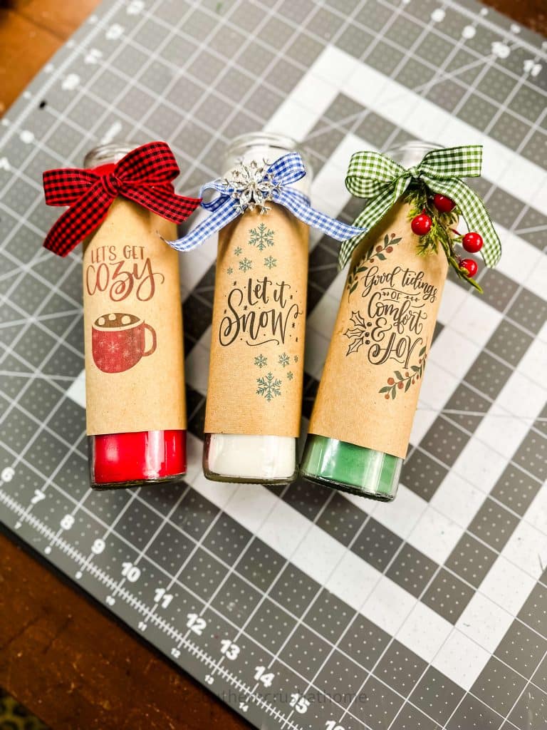 dollar tree pillar candles completed with embellishments