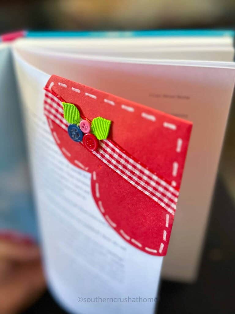 paper heart corner bookmark on corner of book page