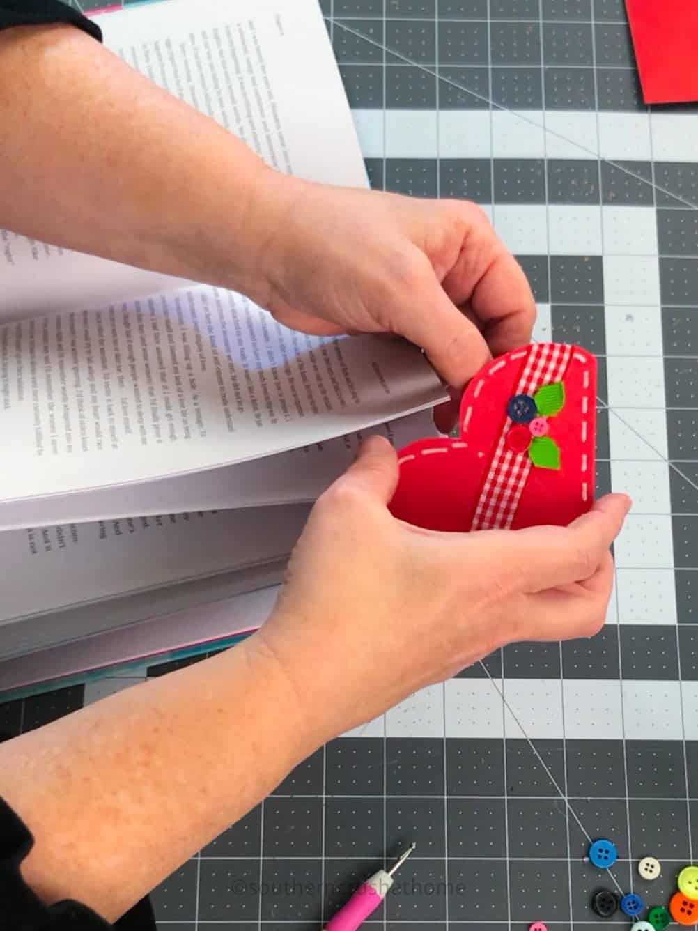 attaching paper heart bookmark