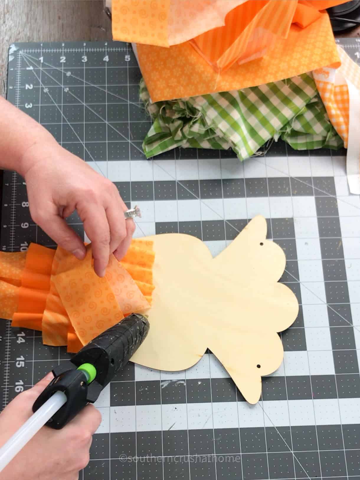 gluing ruffles on to carrot