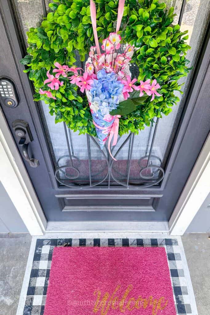 wreath and may day nosegay bouquet on front door