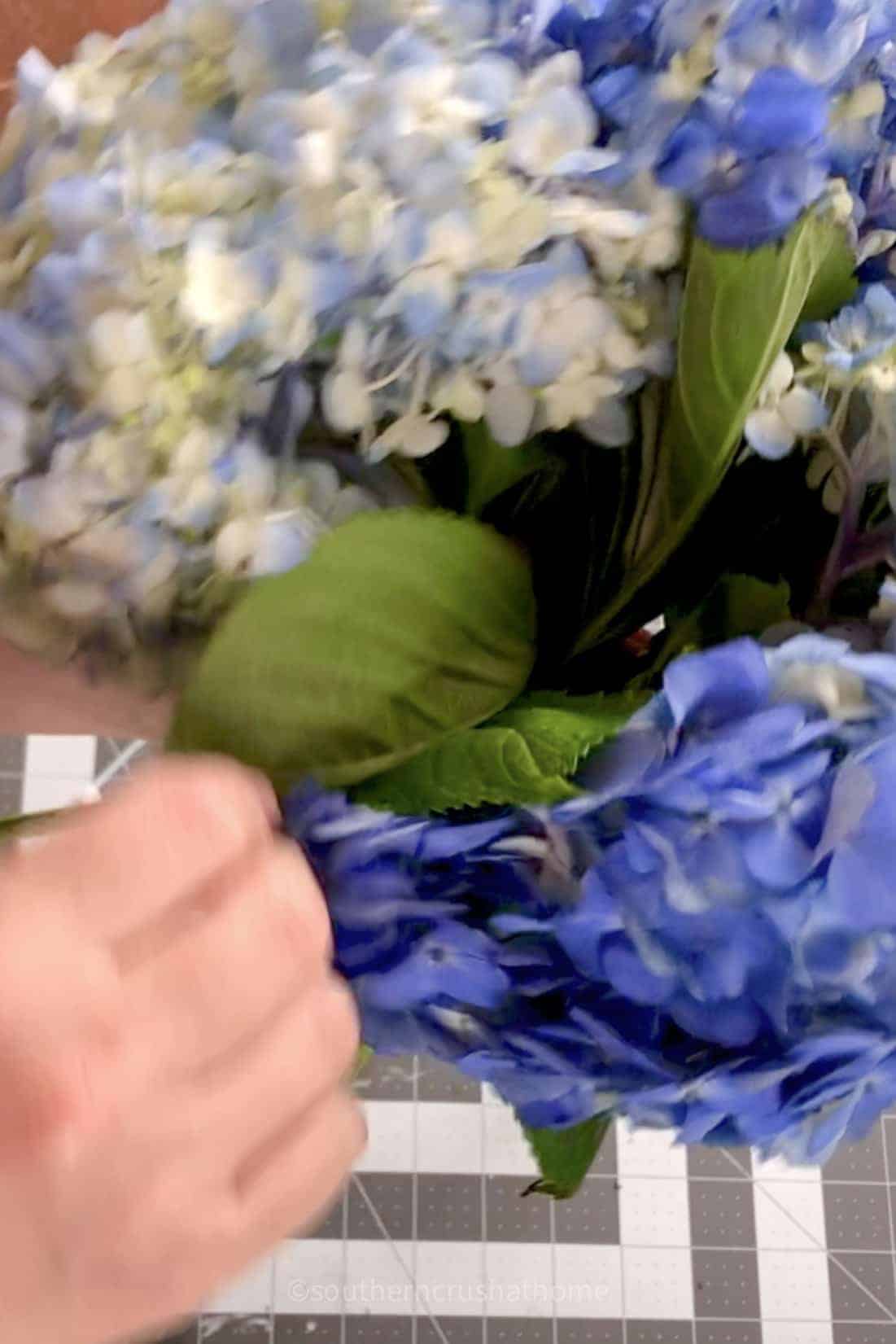 arranging leaves for a bouquet