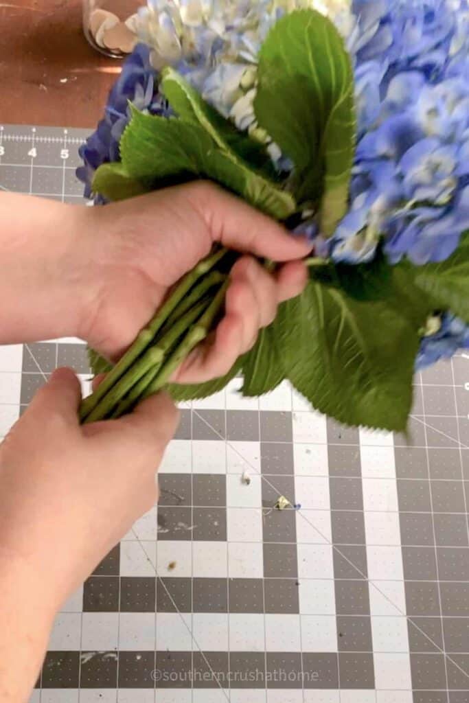 arranging stems for a bouquet
