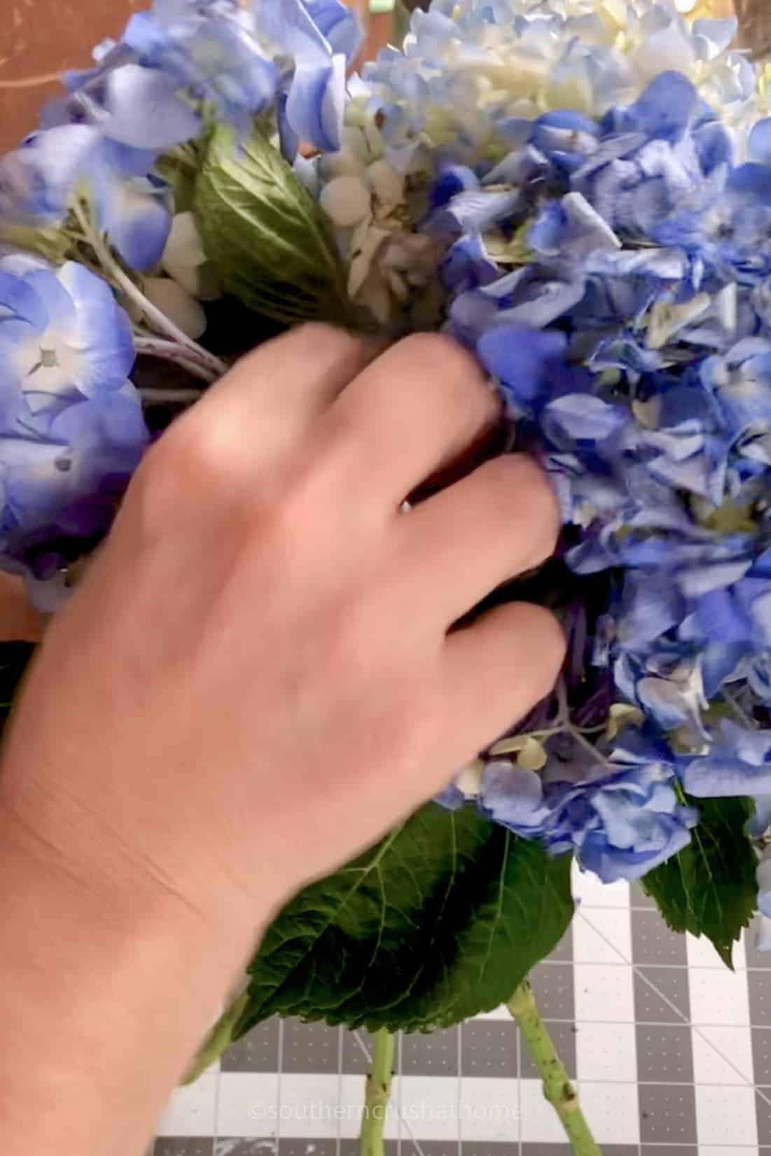 arranging leaves for a bouquet