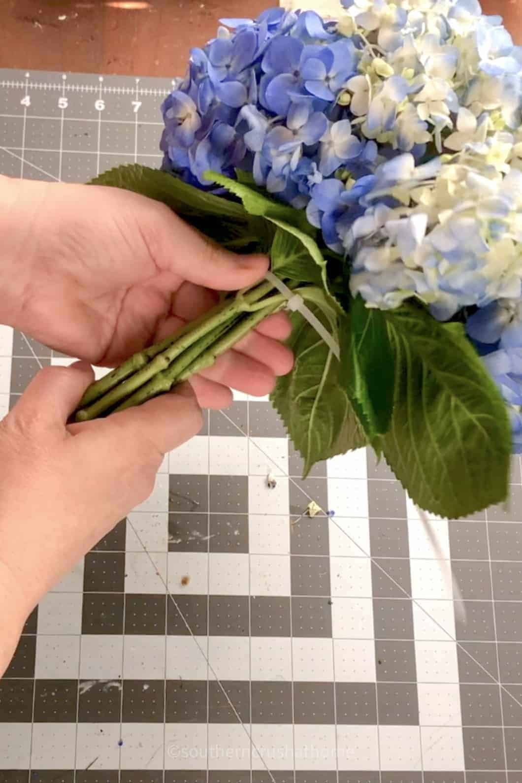 using a ziptie to secure bouquet