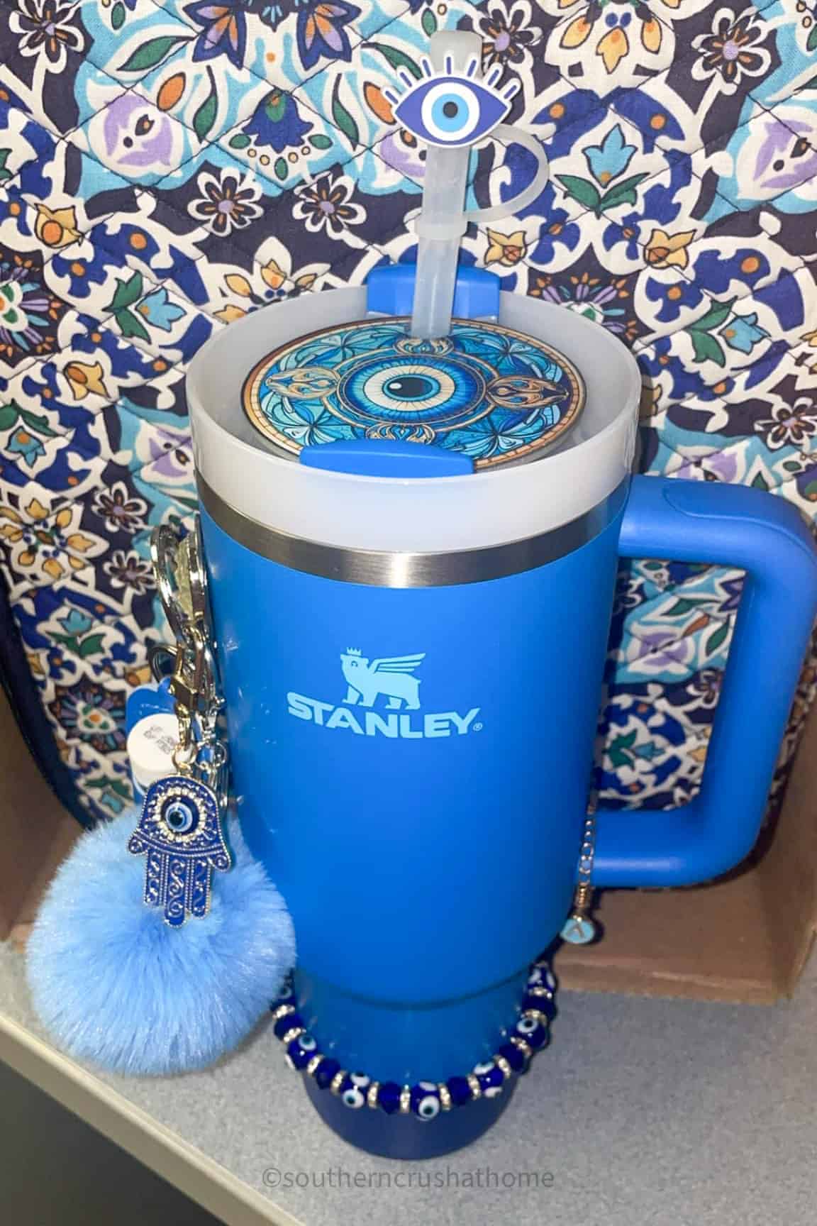 single eye cyclops accessories on blue Stanley tumbler