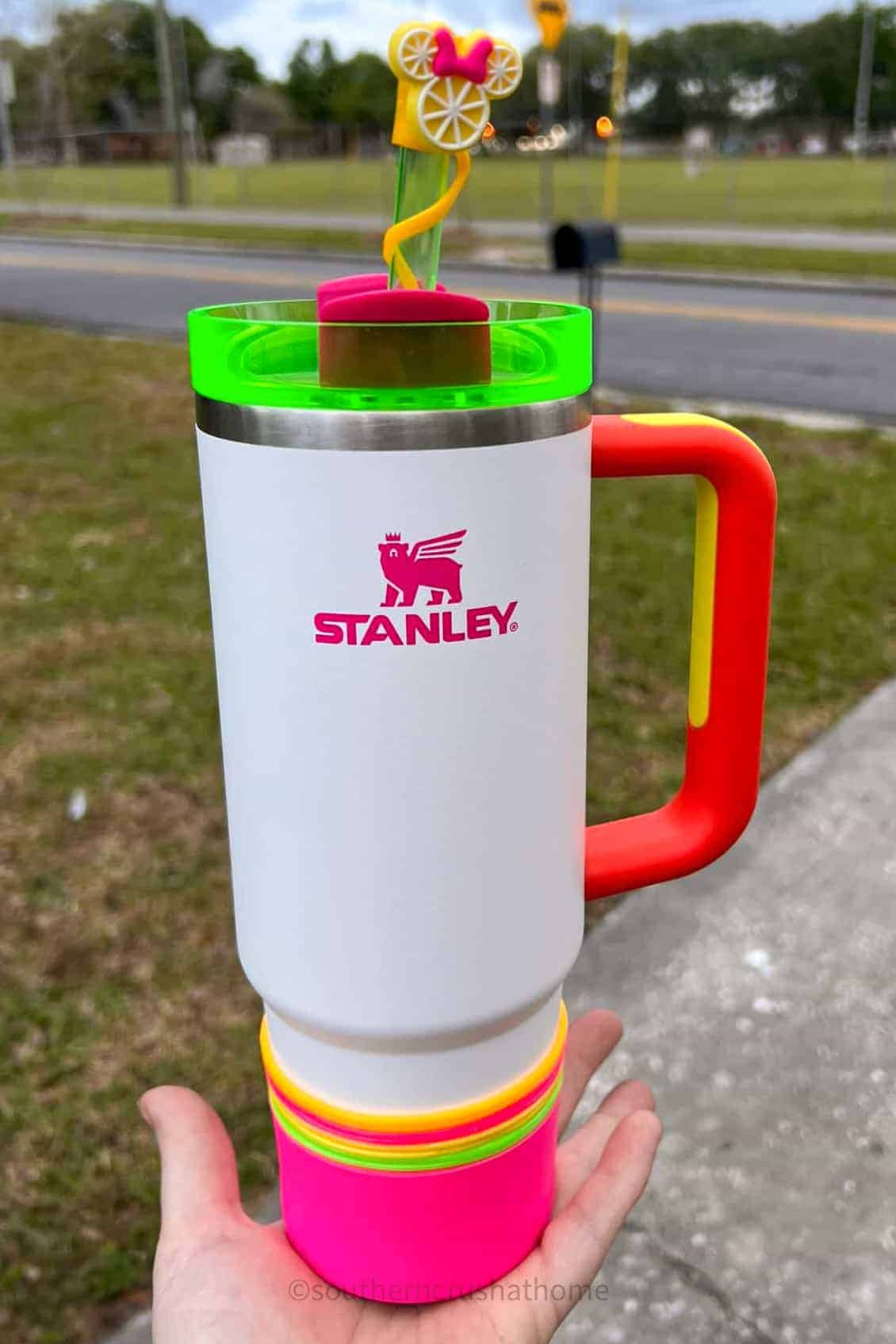 neon Stanley Quencher with bracelets