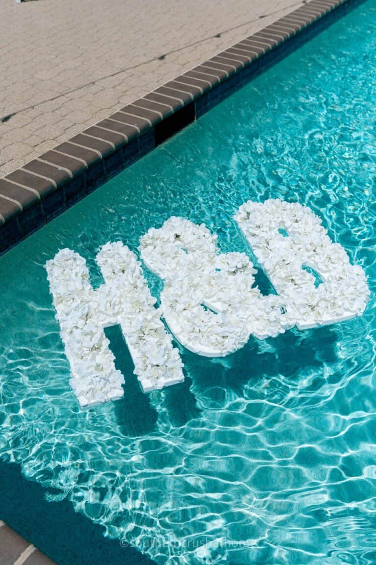 h & b pool wedding decor monogoram