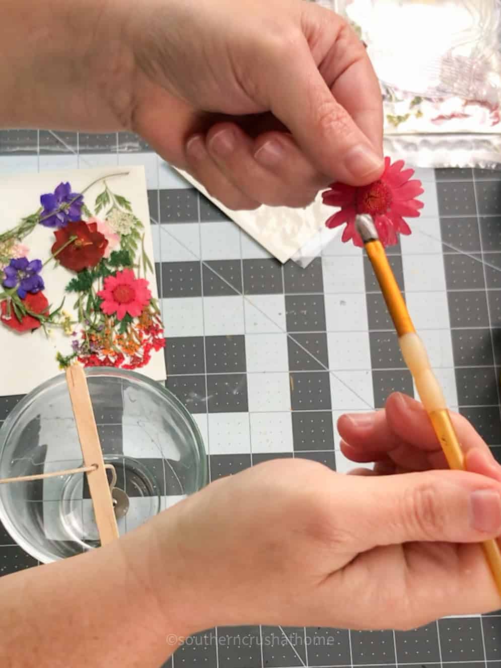 adding wax to dried flower
