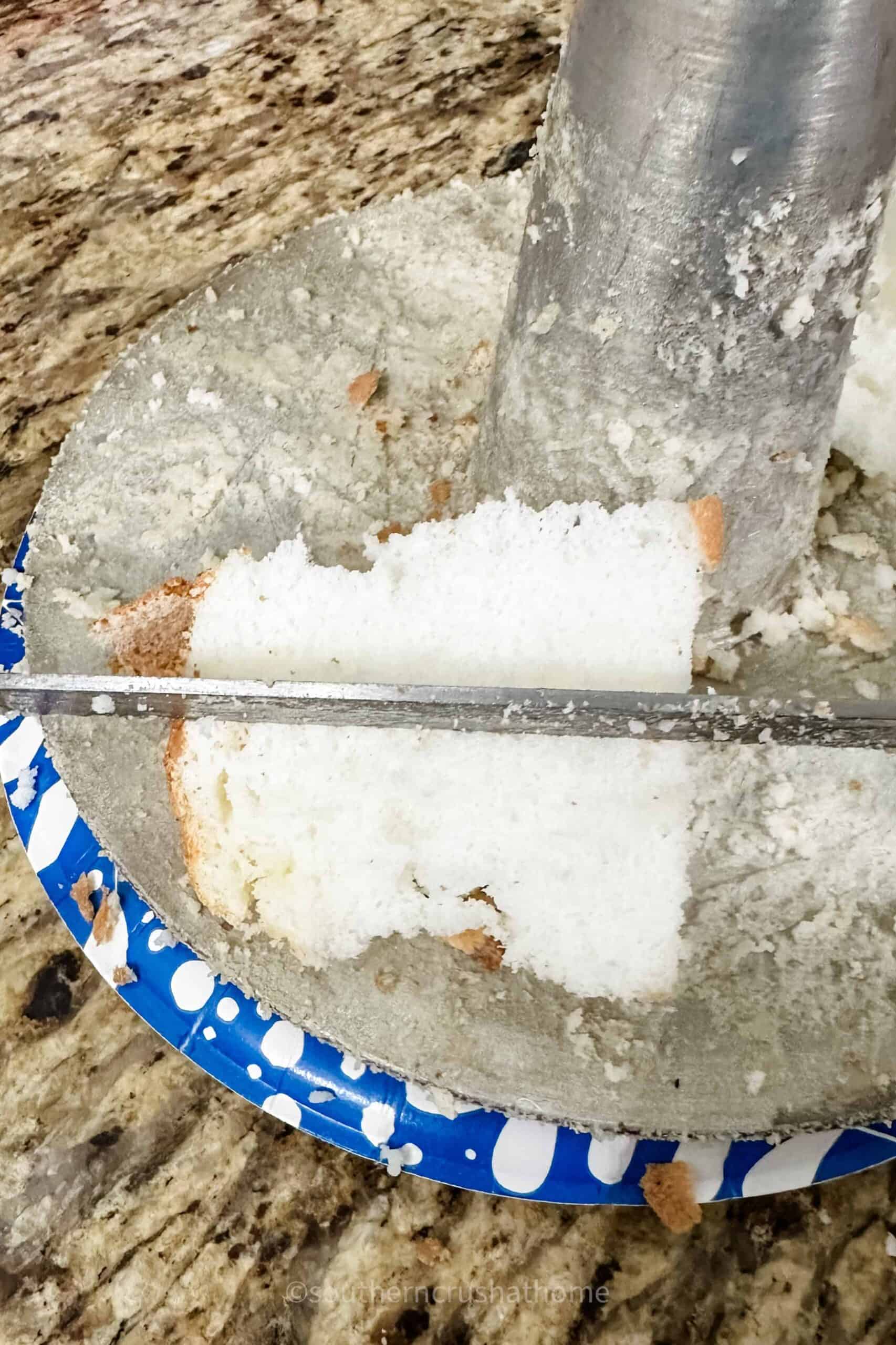 cutting angel food cake into cubes