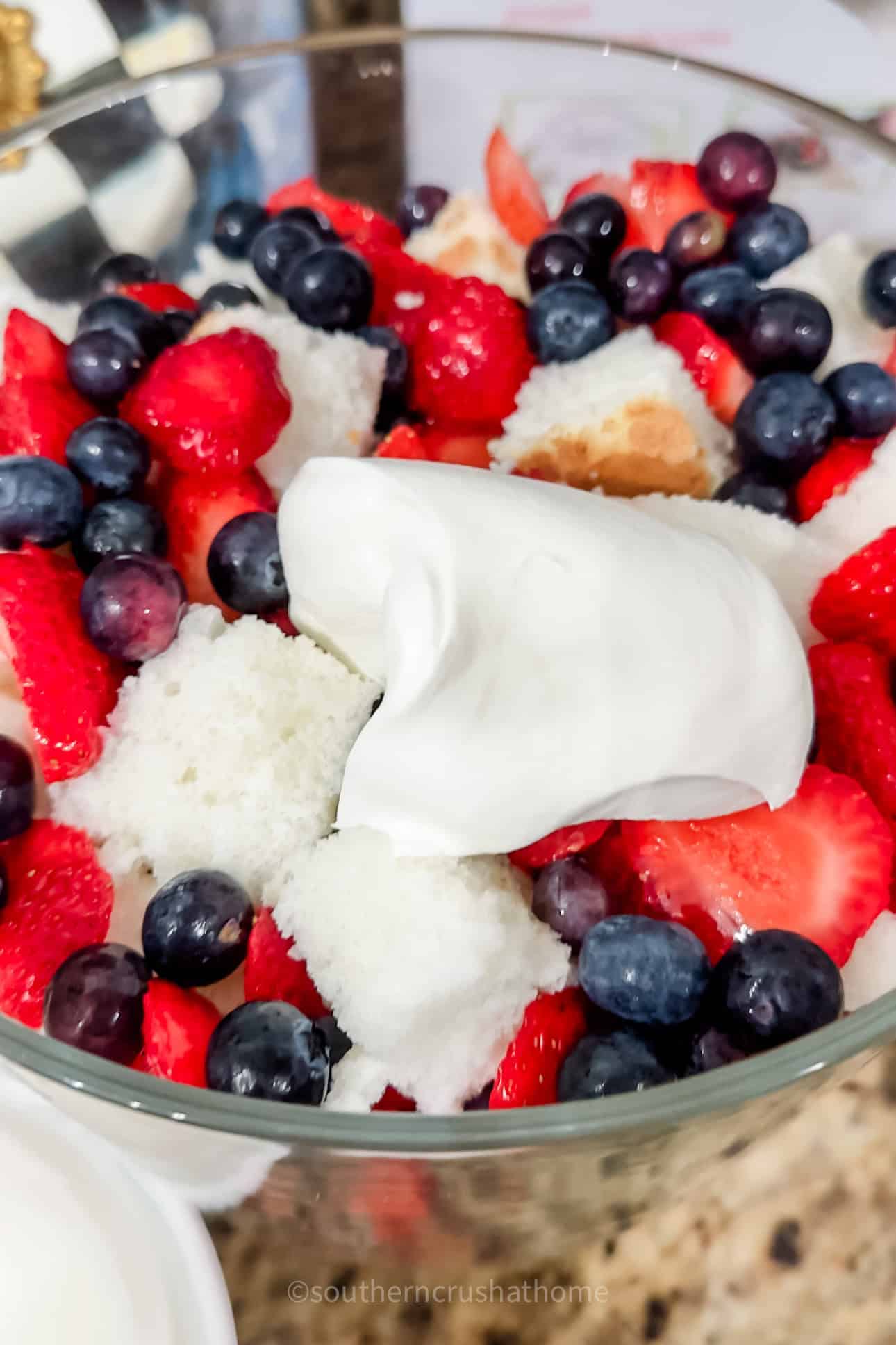 adding cool whip to top of trifle