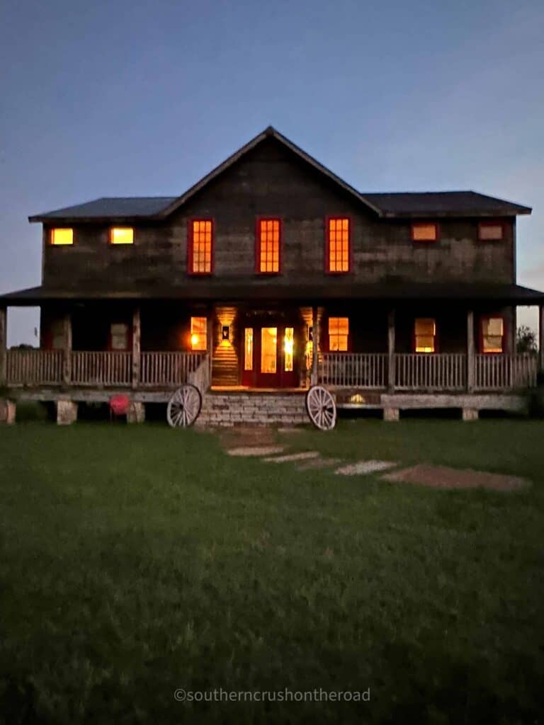 wander inn star house lit up at night