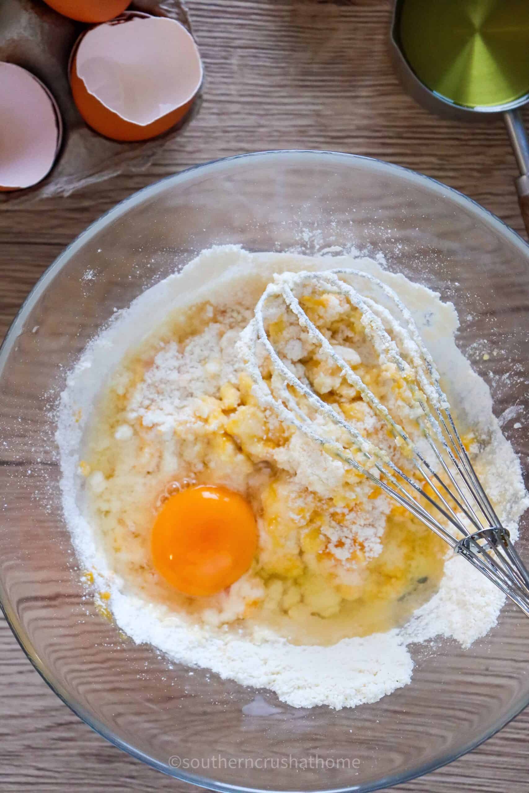 combining eggs and loaf batter