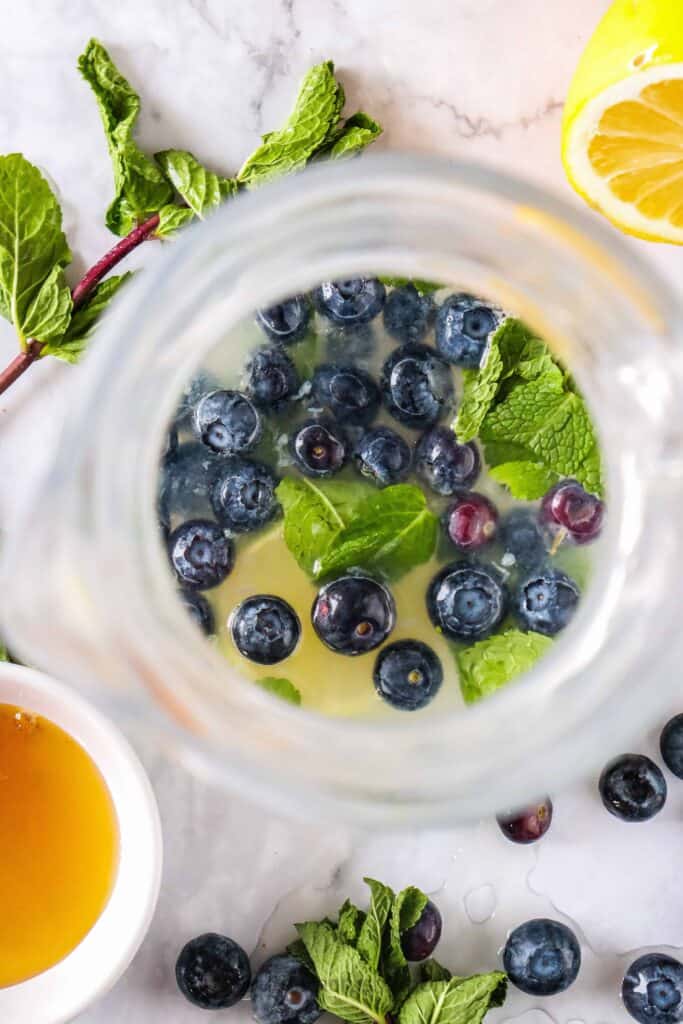 blueberry mint mocktail ingredients ready to muddle
