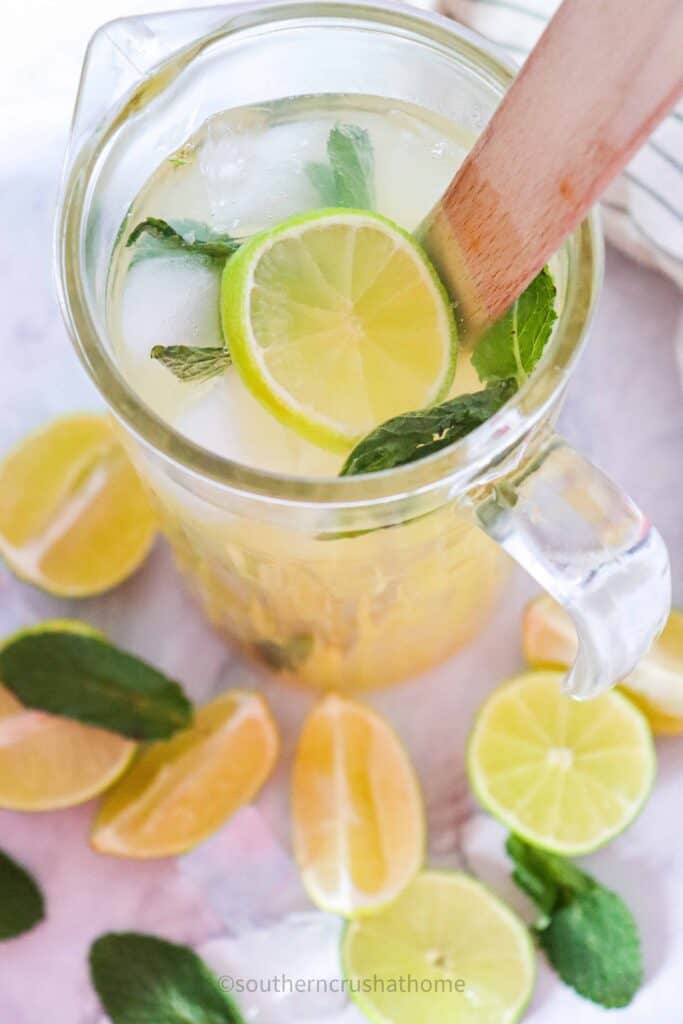 classic virgin mojito mocktail being muddled