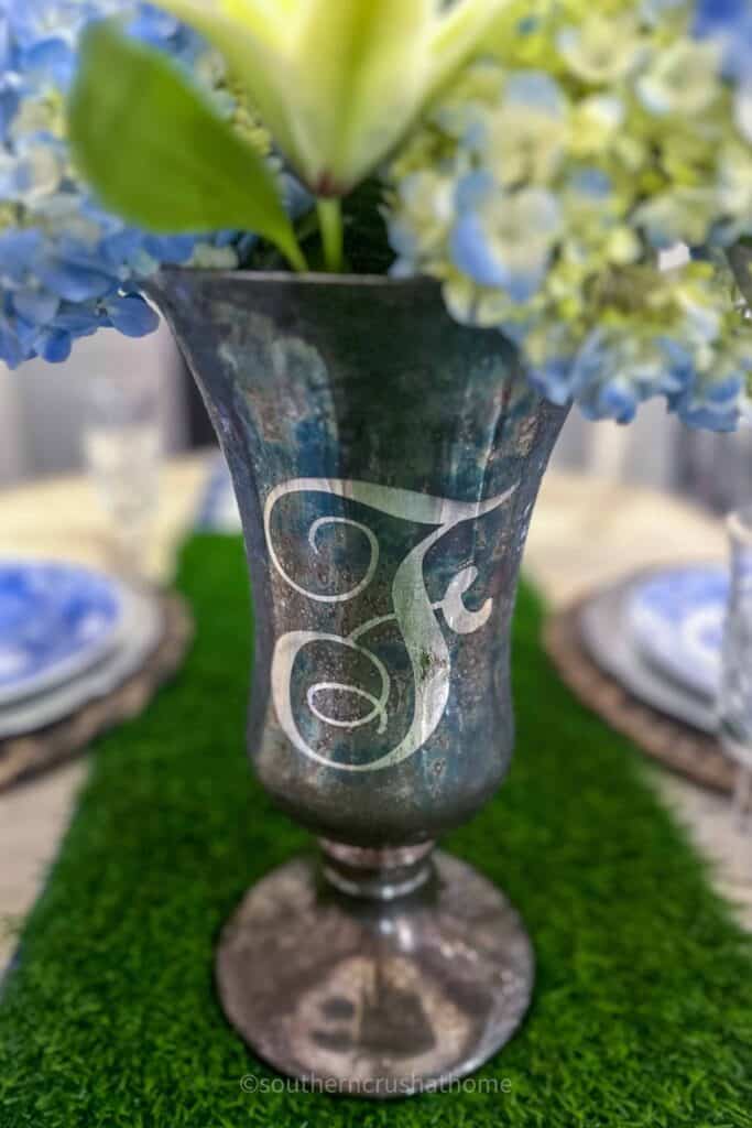 up close view of thrifted tarnished silver vase