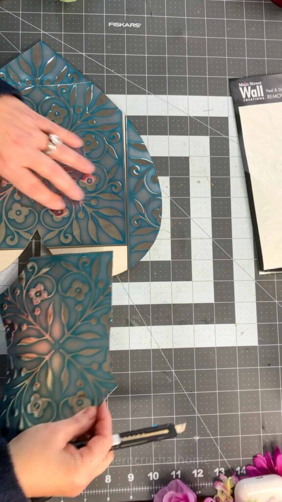 pieces of peel and stick tiles on heart