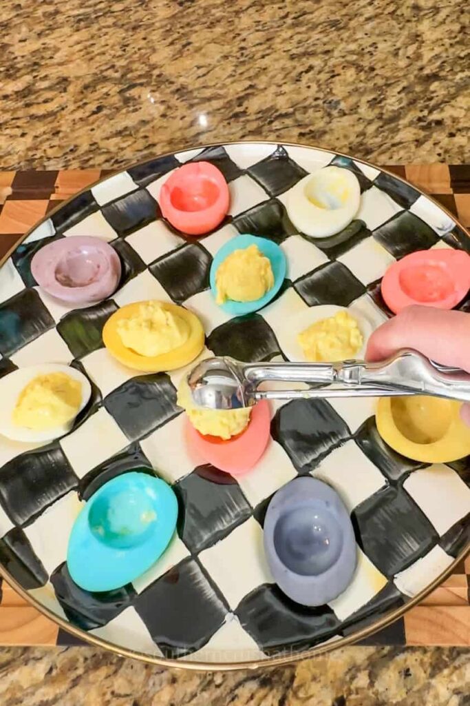 filling colored deviled eggs