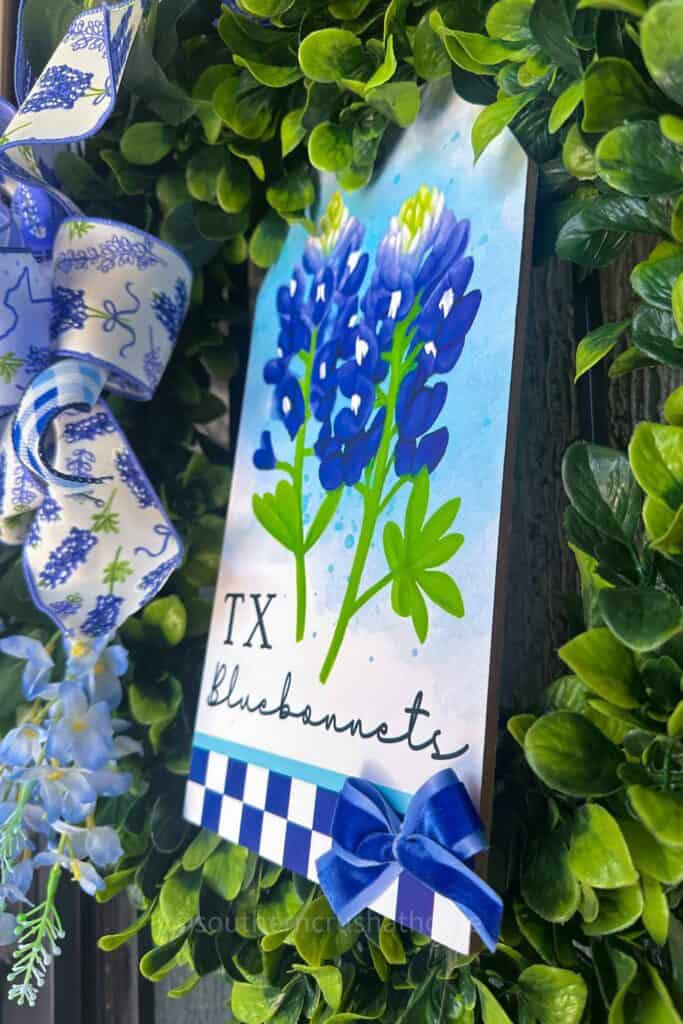 tucking in texas bluebonnets sign