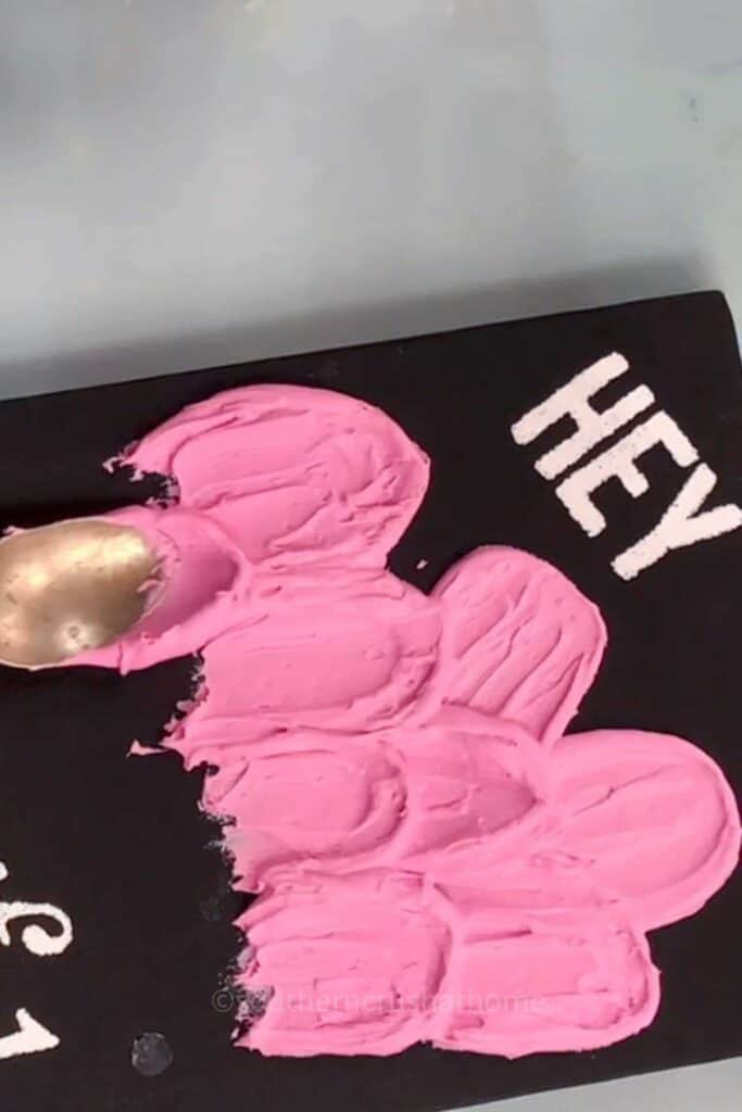 applying spackle to canvas