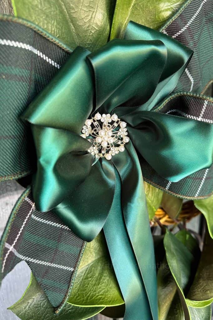 close up of navy tartan plaid ralph lauren inspired bow