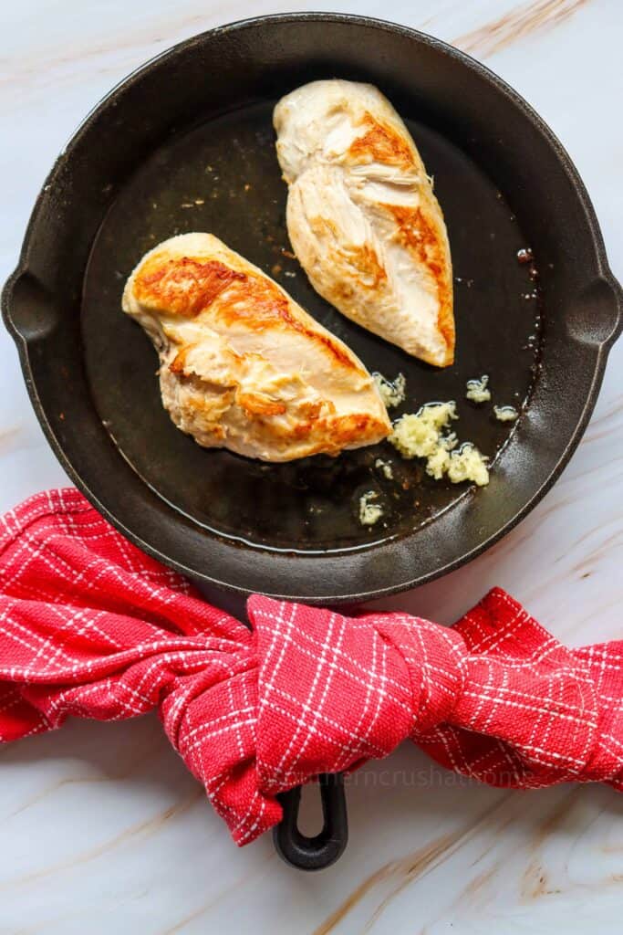 Marry Me Chicken in pan with garlic
