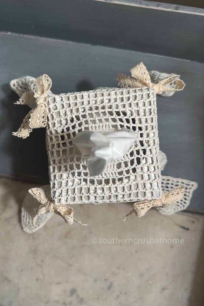 overhead doily covered tissue box