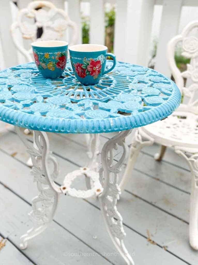 bistro table on back porch at annabellas studio